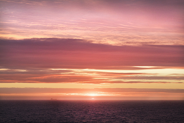 Setting Sun at Sea by Debra and Dave Vanderlaan Setting Sun at Sea by Debra and Dave Vanderlaan